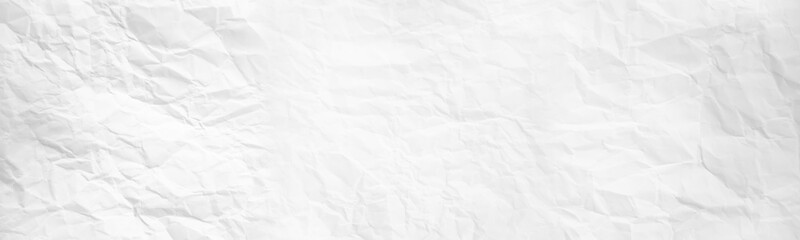 wide panorama crumpled paper texture background. crush paper so that it becomes creased and wrinkled.