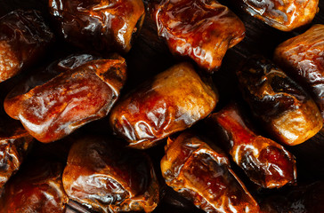 Background of dried dates. Healthy sweets, healthy nutrition.