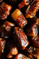Background of dried dates. Healthy sweets, healthy nutrition.