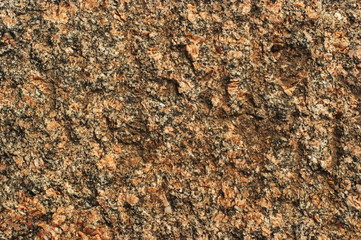 The structure of the stone, such as basalt or granite