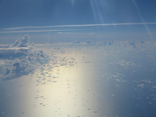 sea of clouds - shot from plane window .        