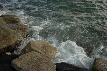 waves crashing on rocks