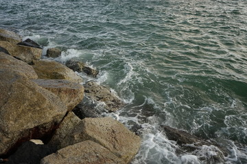 waves crashing on rocks
