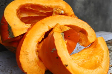 Cut pumpkin. Pumpkin slices and seeds for burlap.
