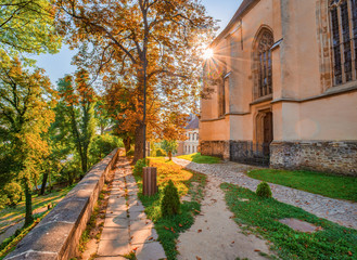 Obraz premium Picturesque sunrise over Church in the Hill. Sighisoara, Transylvania, Romania