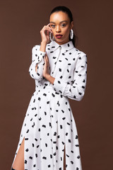 Pretty beautiful sexy elegance woman skin tan body fashion model glamor pose wear trend dress...