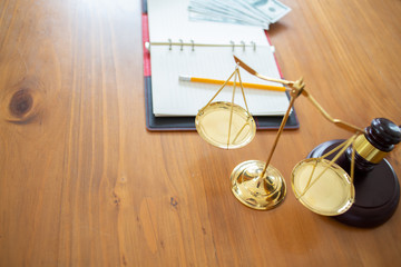Justice law Scales and books and wooden gavel tool on desk in  Lawyer office.concept