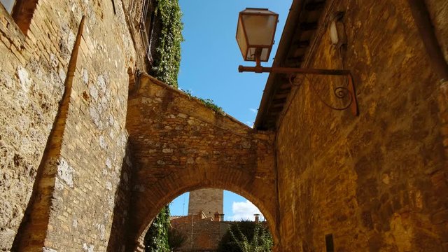 POV walk along the old town of San Gimignano, Tuscany, Italy, a UNESCO World Heritage Site