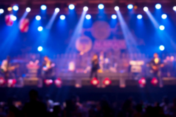 Fototapeta na wymiar Blur stage and light concert concert background. Background image with concert crowd. Party concept