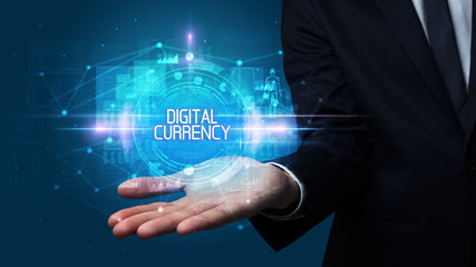 Man hand holding DIGITAL CURRENCY inscription, technology concept