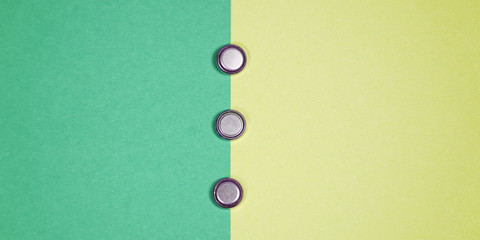 Many different types used or new battery, rechargeable accumulator, alkaline batteries on color...