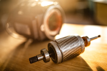 Close-up of a disassembled metal motor with wire