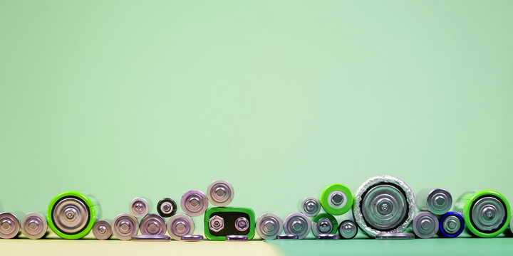Many different types used or new battery, rechargeable accumulator, alkaline batteries on color background.