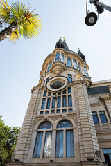 Fototapeta na wymiar The tower building with the astronomical clock is located on Memed Abashidze street in Batumi city - the capital of Adjara in Georgia