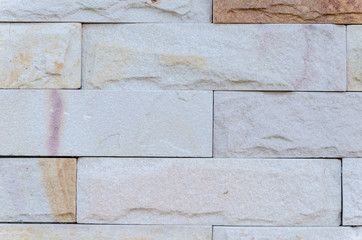 The pattern of  rustic natural stone wall , for background , texture , copy text