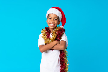 African American boy with christmas hat smiling a lot