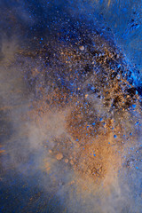 Fototapeta na wymiar dust explosion deep blue yellow colorful magnificent backgrounds