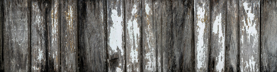 Old white and brown wooden background. Panorama of wood planks texture of bark wood natural with cracked color Paint. The surface of the old Two-tone wood texture.