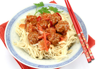 beef dumplings sweet and sour sauce and noodles