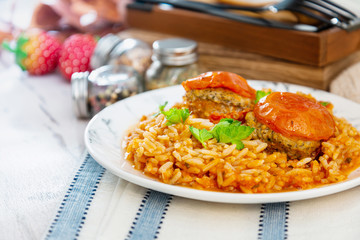 Stuffed tomatoes and rice with tomato