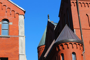 Partial view of Gower Street United Church, St. John's, Newfoundland. Clear, blue sky in background.