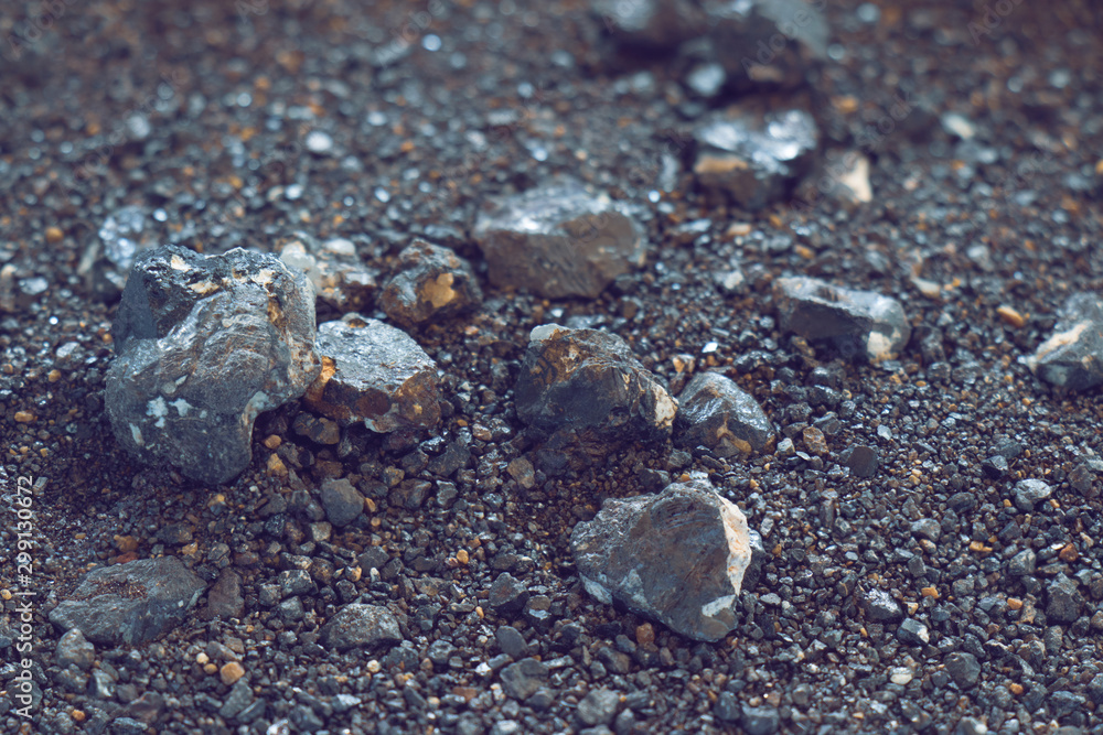 Wall mural small naturally tin ore sifting from streams, process of panning for minerals