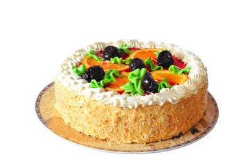 Homemade orange cake with slices oranges and prunes