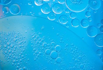 Air bubbles in the water background.Abstract oxygen bubbles in the sea.Circle foamy air in the...