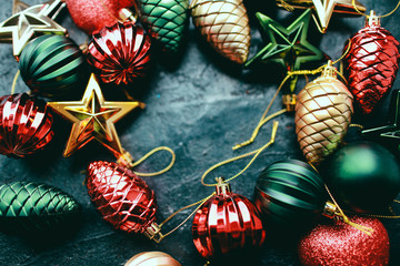 Christmas background and wallpaper.   New Year decoration toys on  a light background. Preparation for winter holidays