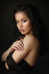 Naklejka premium Studio portrait of young beautiful woman