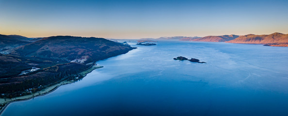 aerial shot of loch linnhe in the argyll region of the highlands of scotland during autumn near sunset