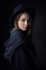 Studio portrait of young beautiful woman