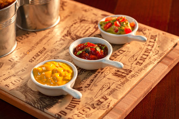 Mustard, Chilli and barbecue sauce served on a table for grilled meat