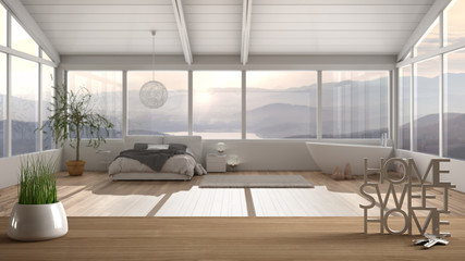Wooden table, desk or shelf with potted grass plant, house keys and 3D letters home sweet home, over minimal bedroom with bathtub, architecture interior design, copy space background