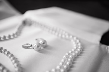pearl earrings and necklace