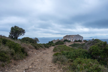 Fototapeta na wymiar Ruined refuge with view of the sea and the mountain of the natural park of Algeciras