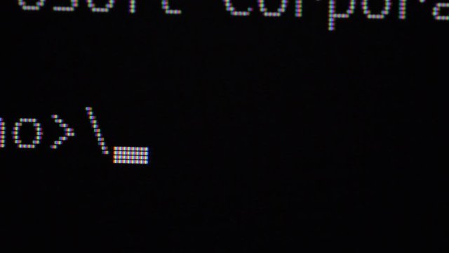 Command cmd black prompt on a computer DOS screen, showing individual pixels closeup of monitor with blinking line