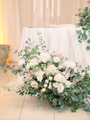 Table settings for a luxury wedding reception. Outdoor wedding