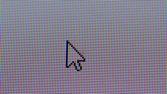 Clicking the closing X button in a computer screen, closeup macro showing monitor individual pixels