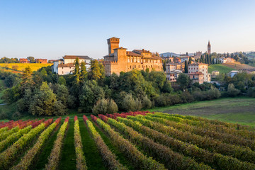 Levizzano Rangone Castle, with vineyards, during autumn. Modena province, Emilia Romagna, Italy - 299139224