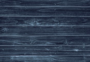 Old dark color wood wall for seamless wood background and texture.