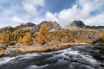 Fototapeta na wymiar Autumn alps landscape, long exposure photography, Italy