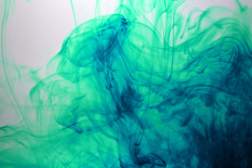 Green Color drops in water background