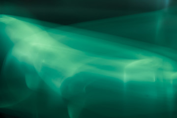Colorful light traces with long exposure. abstract blurred lights background