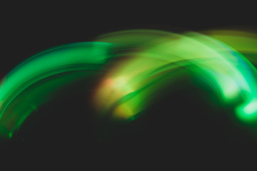 Colorful light traces with long exposure. abstract blurred lights background