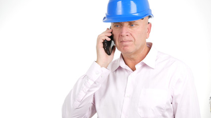 Image with Busy Engineer Talking to Smartphone