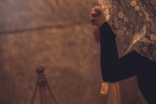 Young Sad Woman Praying In Church