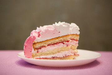 Pink happy birthday cake, sweet food and anniversary celebration