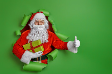 Santa Claus on color background.