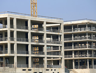 building under construction with concrete wall